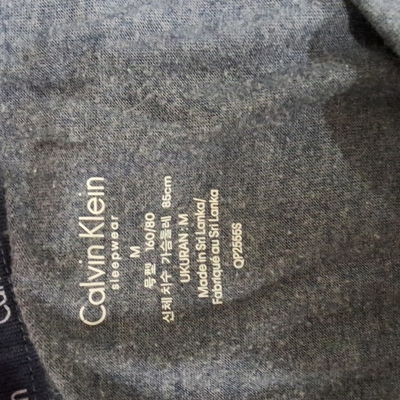 Blueish grey Calvin Klein women's size medium short sleeve w/ 3 buttons on arm - Picture 3 of 12